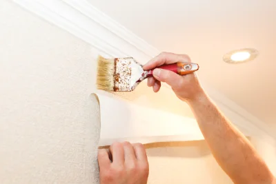 Pose de papier peint à Fromental — revêtements muraux et toiles de verre